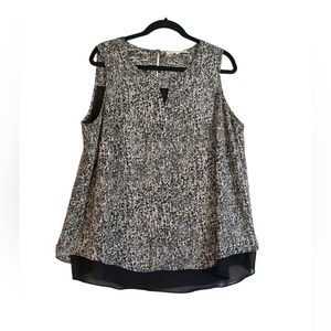 Pre- owned sleeveless blouse !